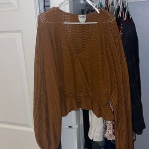 Women’s gold top from Arula their size A